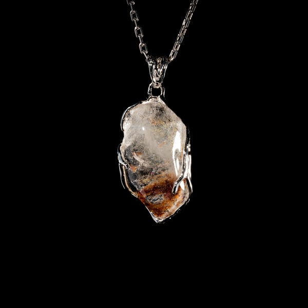 Included Quartz Pendant