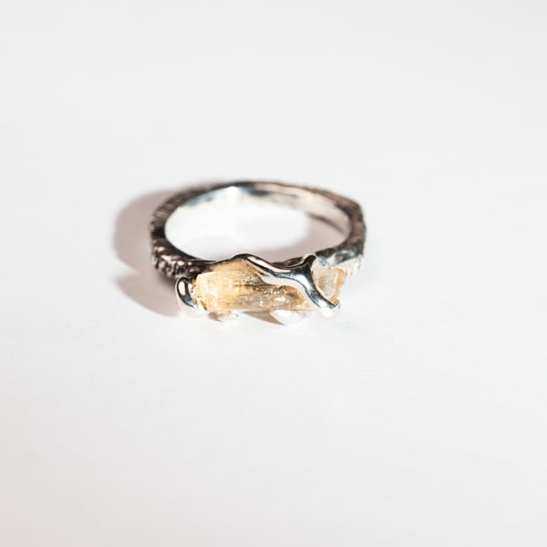 Каблучка з топазом імперіалом