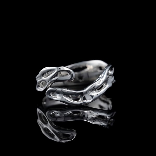 Срібна каблучка на великий палець