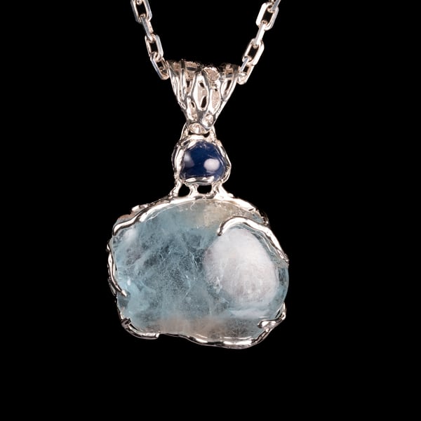 Кулон з блакитним топазом та сапфіром