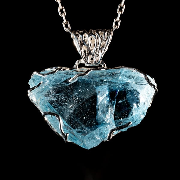 Кулон з блакитним топазом