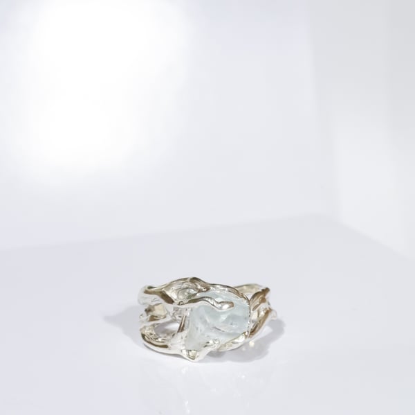 Каблучка з блакитним топазом