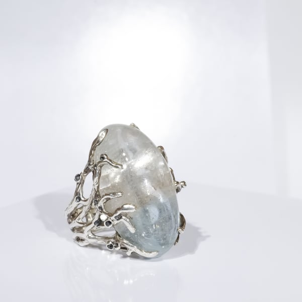 Каблучка з поліхромним топазом